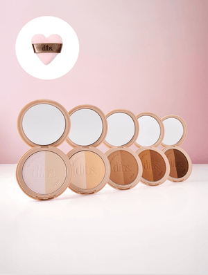 Compact powder in 5 shades with heart shaped puff with 'dibs' branding on a pink background