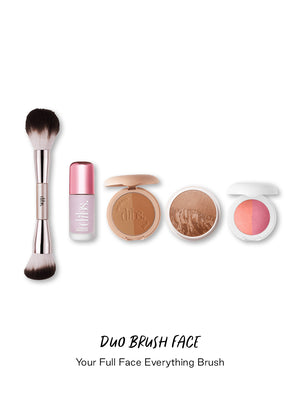 Makeup products including a brush, blush, bronzer, and foundation on a white background