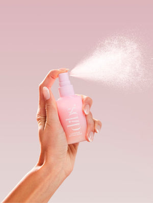 LoveBeam® Setting Spray product shot emphasizing lightweight formula