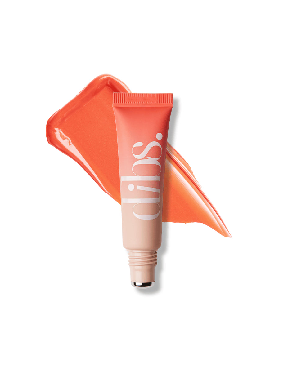 Cool Blush Cheek Stain in shade Summer Girl with coral swatch behind product on a white background