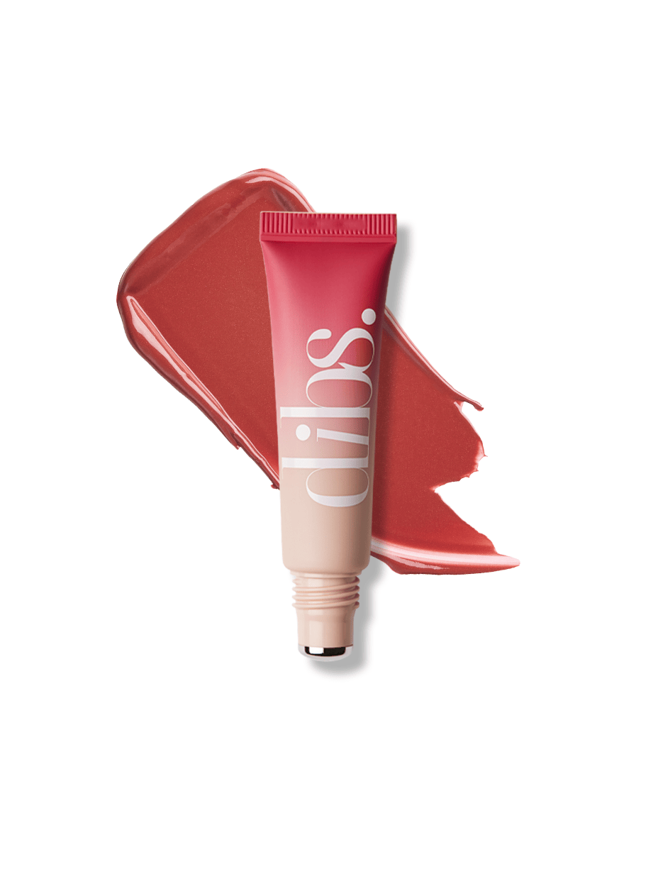Cool Blush Cheek Stain in shade Cool Girl with rose swatch behind product on a white background